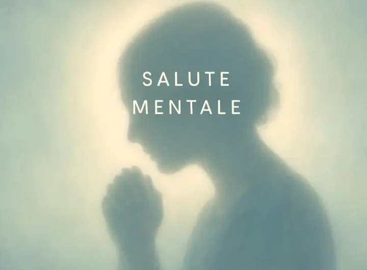 Una silhouette di una persona che tiene la testa tra le mani